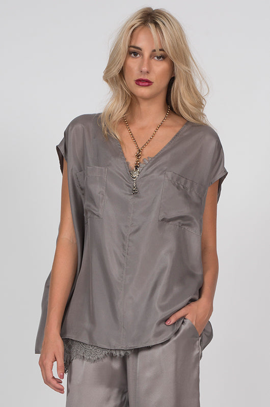 Model is wearing the Habotai Relaxed Silk Tee in steeple grey with the Silk Twill Cuff Pants in steeple grey.