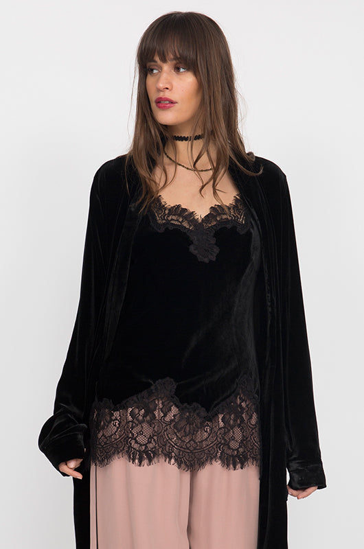 Model is wearing the Anastasia Lace Trim Velvet Cami in black with the Anastasia Lace Velvet Robe in black and the Tencel Wide Leg Cargo Pant in muted rose.