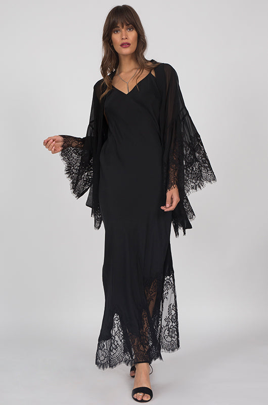 Model is wearing the Long Silk Lace Slip Dress in black with the Coco Silk Lace Kimono in black. Also worn with open toe, ankle strap, black high heels.