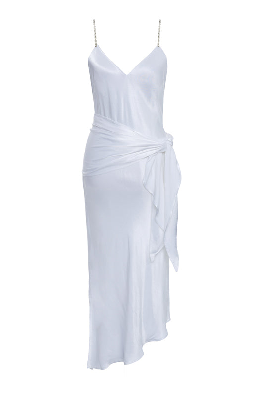 The Aimee Slip Dress in bright white with matching sash worn wide at the hips.