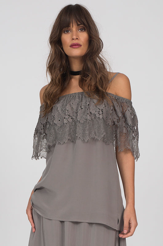 Model is wearing the Julia Lace Silk Off The Shoulder Top in steeple grey with the Hammered Silk Belted Pants in steeple grey.