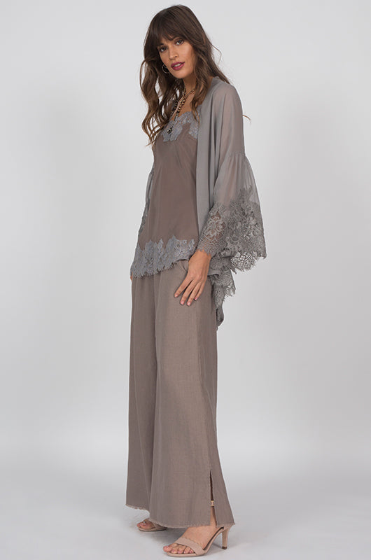 Model is wearing the Coco Silk Lace Kimono in steeple grey, opened, with a Coco Lace Silk Straight Cami and linen wide leg pants.