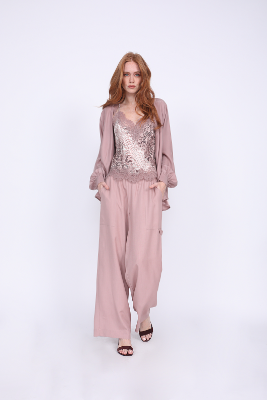 Model is wearing the Python Silk Print Racerback Lace Cami in muted rose python with the Tencel Cargo Wide Leg Pant in muted rose and the Silk Wrap Top in muted rose, worn open. Also worn with open toe, ankle strap, burgundy high heels.